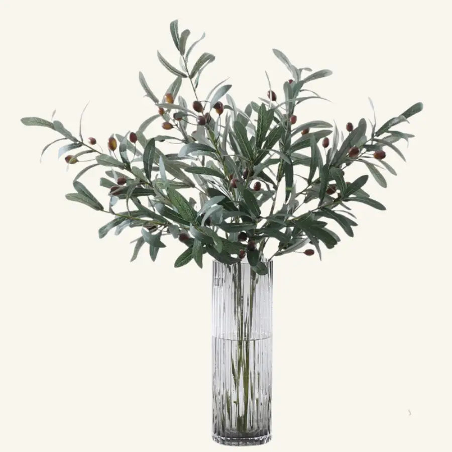 Vase en verre transparent à branches d’olivier artificielles aux feuilles argentées