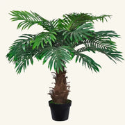 Cycas artificiel luxuriant en pot noir élégant