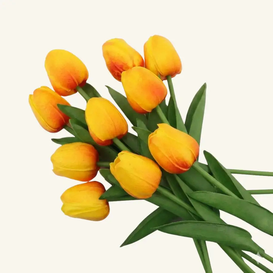 Bouquet de tulipes artificielles orange vives avec tiges et feuilles vertes